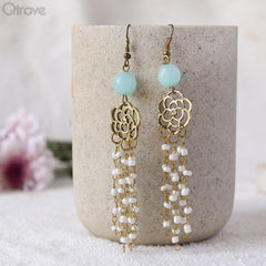 Handcrafted Oceanic Pearl Earrings at Qtrove