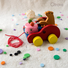 Handcrafted Wooden Bear Pulling Drums at Qtrove