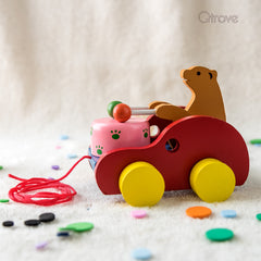 Handcrafted Wooden Bear Pulling Drums at Qtrove