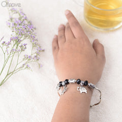 Handcrafted Charm Bracelet With Black and Silver Beads at Qtrove