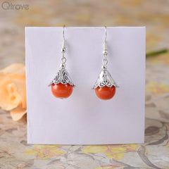 Handcrafted Metal Earring With An Orange Drop at Qtrove