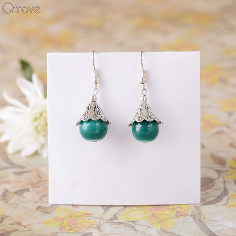Handcrafted Metal Earring With A Peacock Green Drop