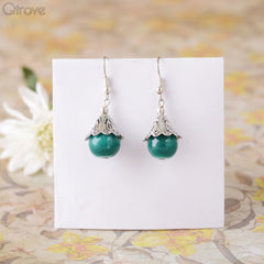 Handcrafted Metal Earring With A Peacock Green Drop at Qtrove