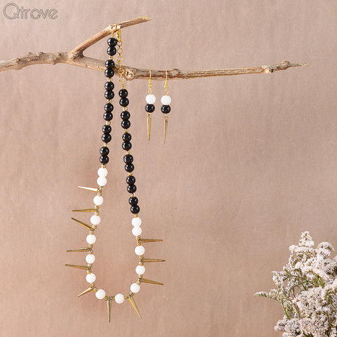 Handcrafted Black And Pearl Necklace With A Rustic Gold Spikes