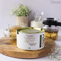 Shining Arrows – White Tea at Qtrove
