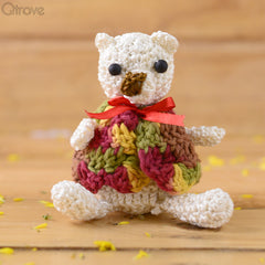 Furry White Crochet Teddy Bear in Red Bow at Qtrove