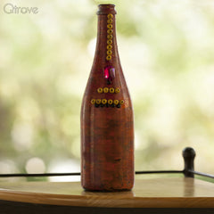 Bronze Goddess Designer Bottle at Qtrove