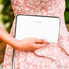 Monochrome Leather Snow Wristlet at Qtrove